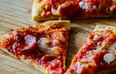 Pepperoni pizza on a chopping board pizza near me catering near me caterer