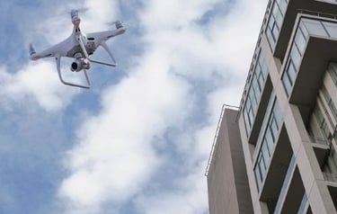 Drone Inspecting Mid Rise Building