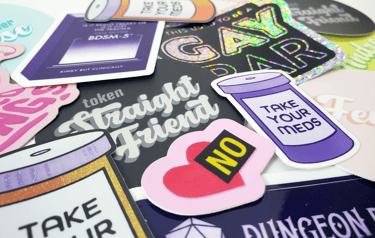 a pile of assorted stickers