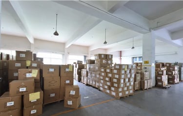 Goods are neatly arranged on the shelves in the factory warehouse, with clear labels