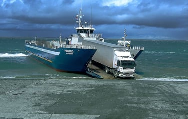 a truck driving on a large body of water