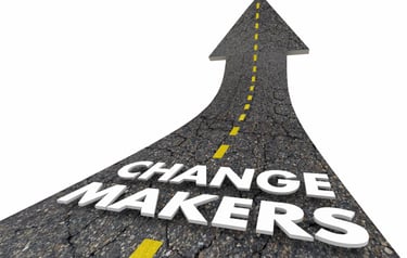 a road forming shape of an arrow headed up, change makers