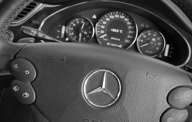 Steering wheel and instrument cluster of a 2006 Mercedes CLS350