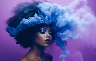 Ethereal portrait of a woman with dark curly hair merging into blue and purple smoke clouds against 