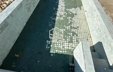 finising batu alam andesit kolam renang.