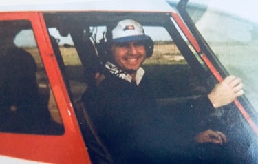 a man in a helicopter