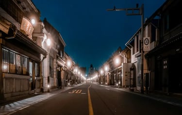 Night view of a heritage street with illuminated buildings on both sides.