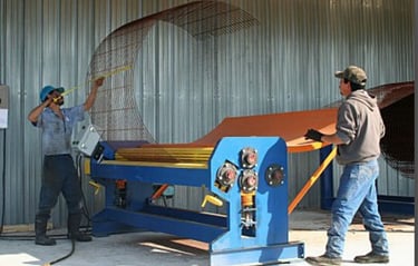 Manhole cage roller machine