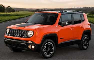 Jeep Renegade Diesel 4x4 laranja estacionado em uma estrada rural