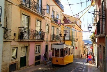 Lisbon - an old world city with cobblestone streets that blends ancient & modern