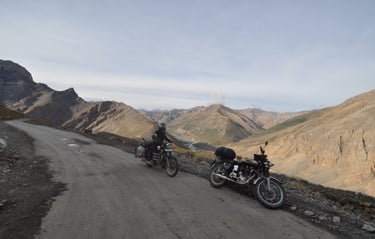 Tracey Billington riding the Leh to Manali highway over the great Himalayan range, Ladakh, India 
