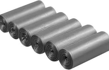 a group of rolls of black plastic bags
