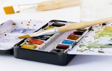 a-watercolour-paint-tin-and-brush