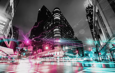 Toronto at night in a black and white photo with neon bursts coming from it for Helena's new LitRPG