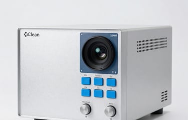 Clean product photo of a high-frequency laboratory generator against a neutral white background, featuring a precise user interface with bright blue buttons.