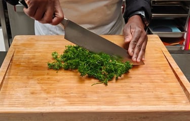 Professional chef's knife on cutting board