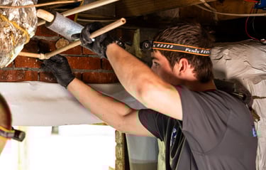 Caleb Smith rerouting PVC pipes
