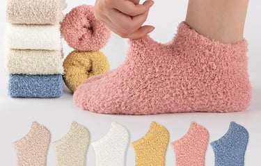 a person wearing slippers and socks with a person holding a cell phone