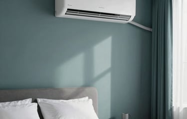 An elegant, minimalist bedroom featuring crisp white linens and a modern wall-mounted air conditioner. The design incorporates deep slate and soft teal accents, evoking a refreshing and pure airflow. Gentle daylight filters through sheer curtains in a premium home in a Global / North American and Australian context. High-end real estate photography.