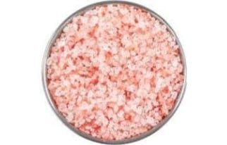 Pure Himalayan pink salt granules packed for culinary use