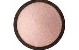 Himalayan pink salt chunks showing natural texture and crystal structure