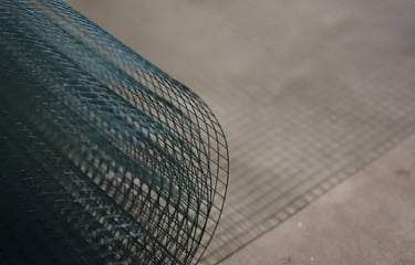 Chicken wire rolled out on the floor