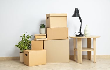 Packed boxes and decor — downsizing and transitions support by simplelilac