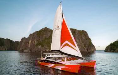 Private luxury yacht cruising through Bacuit Bay, El Nido.