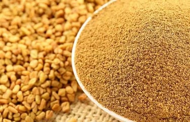 A white bowl filled with ground fenugreek powder next to a pile of whole fenugreek seeds on a burlap sack.