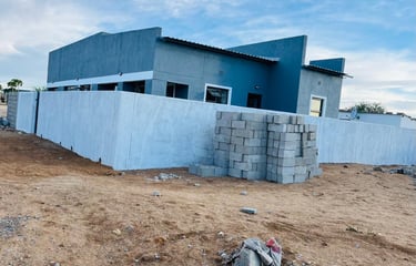 a house with a pile of rubble and rubble House Construction Frans-del Investment CC Construction com