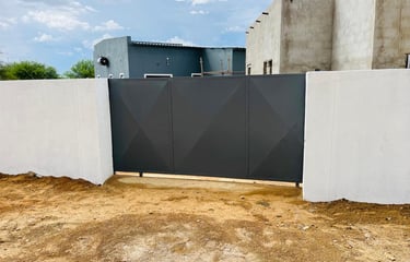 a fenced in area with a fenced in area with a fenced in, House Construction Frans-del Investment CC