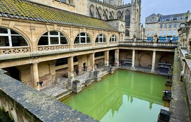 Roman Baths in Bath with reflections in the water