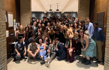 Lovetteers pose in Middle Commons during Middle Commons Ball
