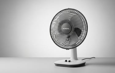 a fan on a table with a white table top