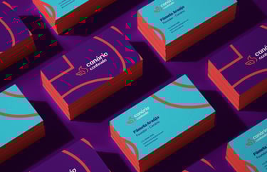 a bunch of business cards with a purple and orange background
