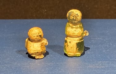 Glass figures from queens burial