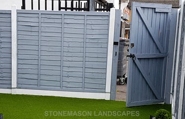 Standard lap panel fence painted grey with white concrete Romford - Hornchurch - Brentwood
