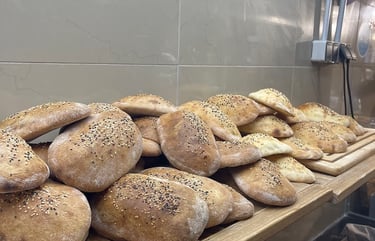  logo zagros gemüse kebap berlin a bunch of breaded breaded breads on a table