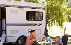 family camping by lake
