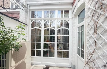 Porte fenêtre en bois blanc
