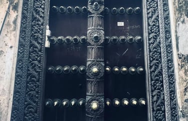 zanzibar-traditional-wooden-door-stone-town. Intricately carved with Arabic and Indian influences, this iconic Zanzibari door