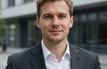 Professional headshot of a man in a business suit, looking approachable, modern architecture in the blurred background, Northern European / Baltic / Estonian.