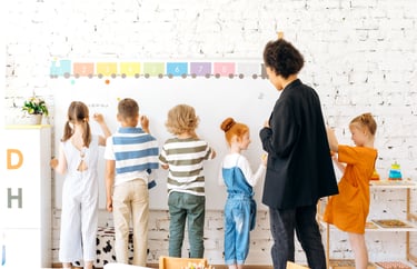 a teacher teaching children in a classroom