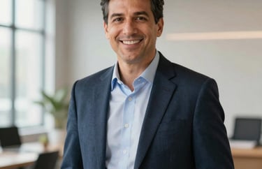 A professional portrait of an expert consultant in North American attire, standing in a bright, modern studio space.