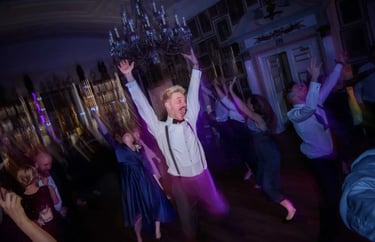 wedding dance floor with guests dancing
