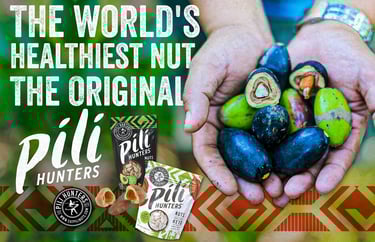 a person holding a bunch of fruit and nuts