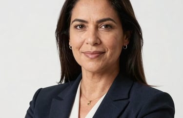 Professional headshot of a South American / Brazilian female lawyer in professional attire, Soft White studio background, modern legal style.