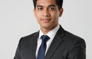 Professional headshot of a young South American / Brazilian lawyer, professional business attire, clean Soft White background.