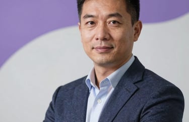 Portrait of a digital marketing expert in a North American corporate setting. Confident expression, wearing professional contemporary clothing. Soft purple and white backdrop.