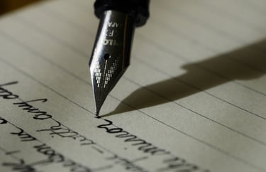 Close-up of a Pilot fountain pen nib writing cursive text on lined paper.